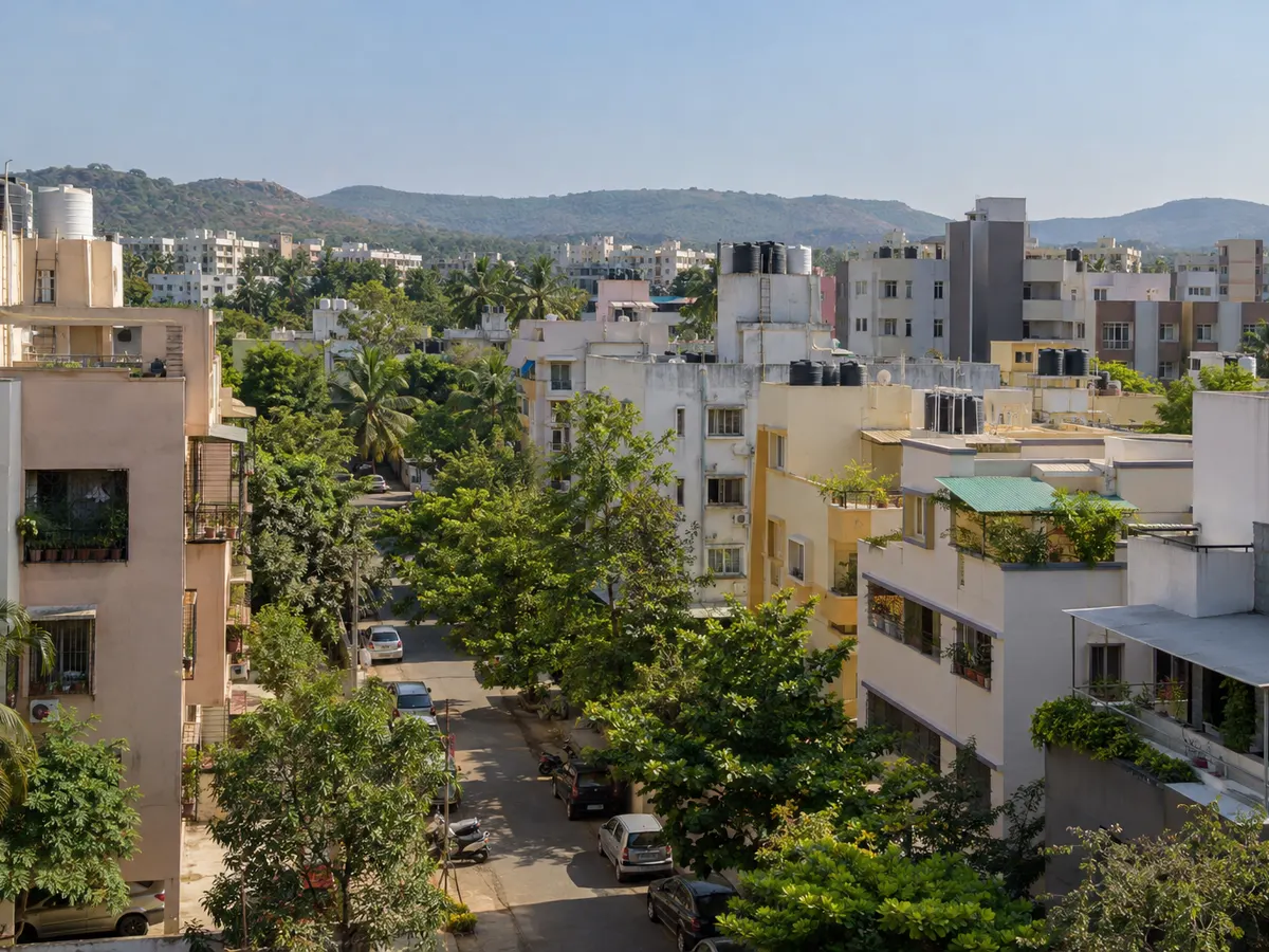 Neighbourhood of mid-rise apartment buildings with water tanks on several rooftops